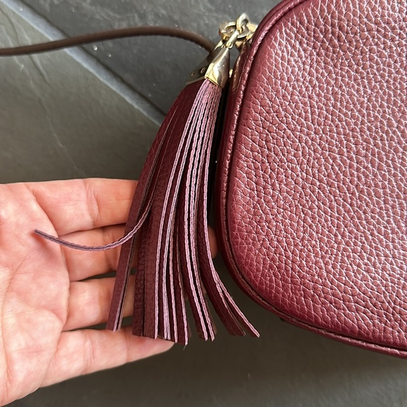 Kate Spade purse.  Used one time.  Maroon/ reddish leather.  Camera bag style. - Picture 3 of 9